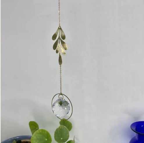 Aurinkosieppari, kristalli ja lehti